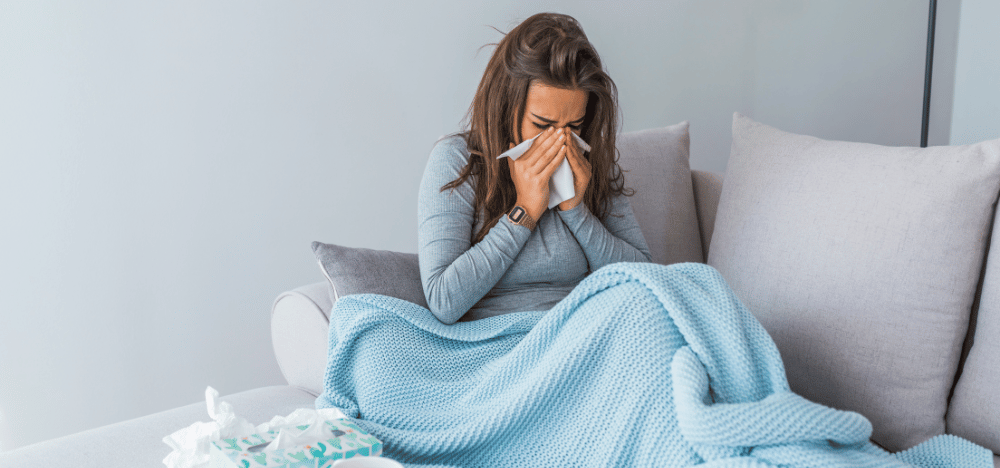 Decorative image of someone suffering with the flu